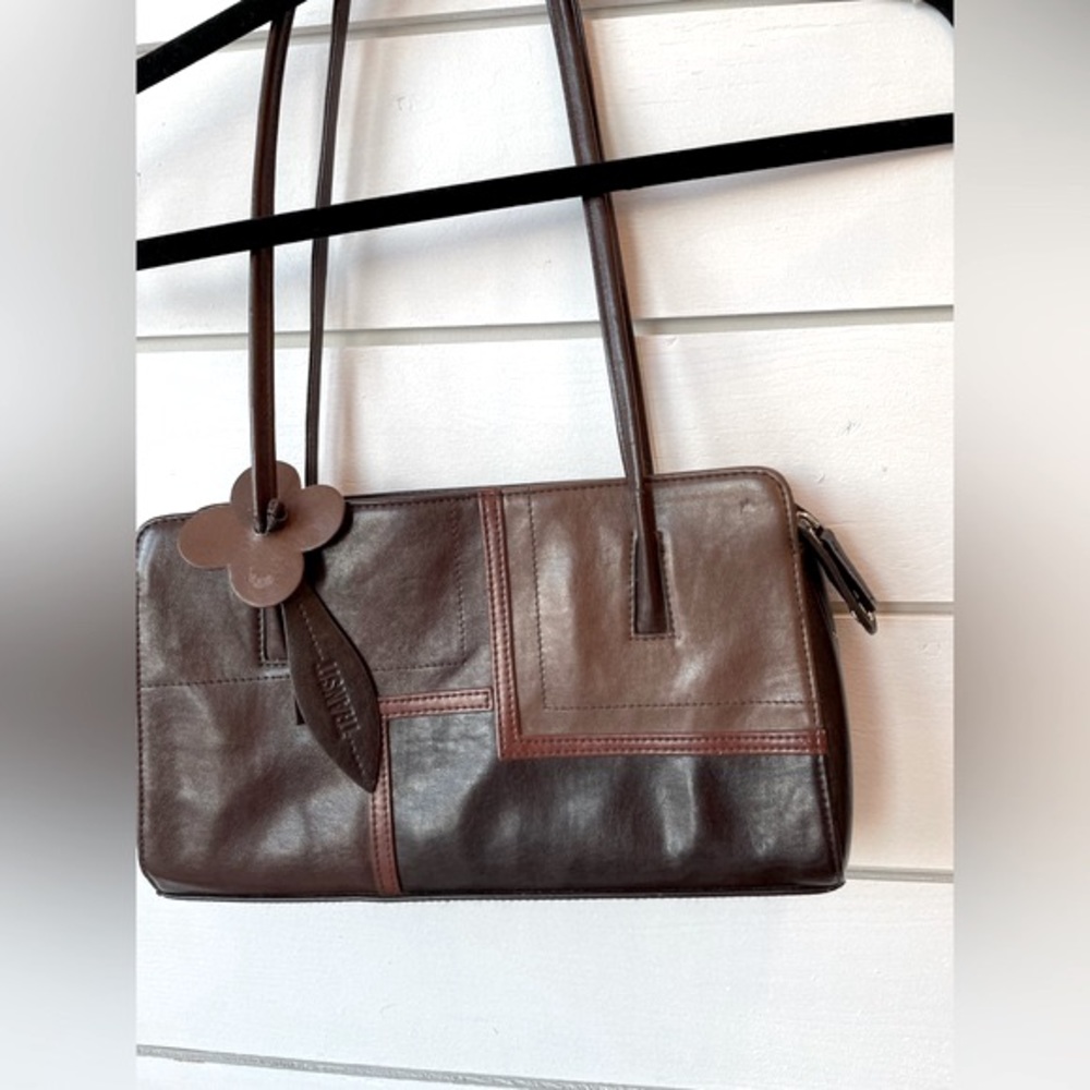 Transit shoulder tote with three toned ext. in brown shades with a cute flower